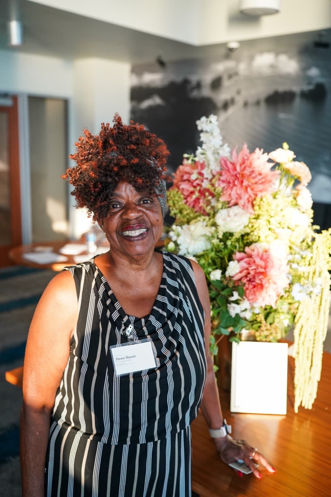 A guest beside the florals